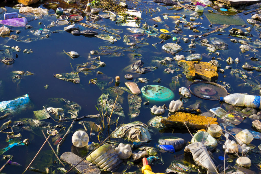 Environment pollution - plastic floating in the water
